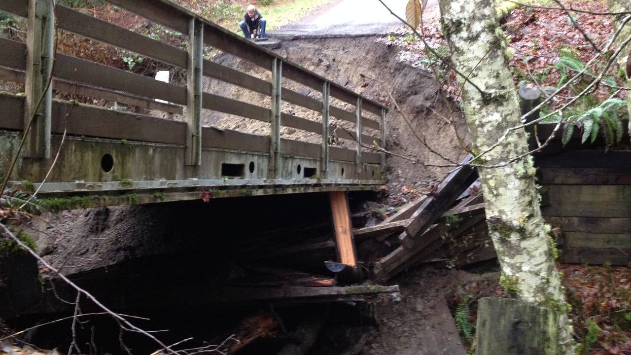 Washed out bridge strands rural neighborhood near Port Angeles