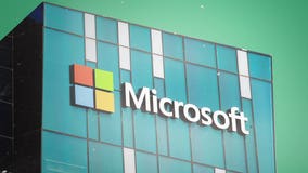 Microsoft profits down 14% as Windows hit by weak PC sales