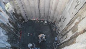 Tunnel contractor completes excavation of 120-foot-deep pit to access damaged Bertha machine