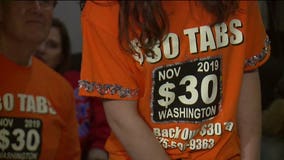 $30 car tab measure passes in Washington, billions to be cut