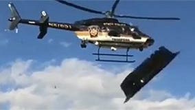Watch police helicopter send tailgate tents flying in attempt to break up rowdy party at Penn State