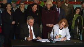 'I'm signing this in green!' Mayor Durkan inks KeyArena deal to lure NBA, NHL teams