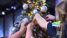 Tree decorators design over 30 trees for annual fundraiser