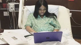 Woman finishes finals while in labor at the hospital