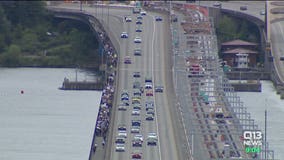 Seahawks wives lead a walk across I-90 bridge in support of Black Lives Matter movement