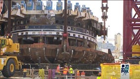 Bertha's repaired cutter-head being lowered back into access pit