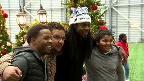 Richard Sherman gives back, helps families celebrate holidays with special event