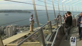 Reward for quickly racing up the Space Needle's 832 steps? Walking on the outside of the halo...