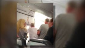 Airline says man fought flight attendant, opened door of taxiing Frontier plane