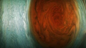 Spacecraft reveals beauty of solar system's biggest storm