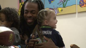 Richard Sherman surprises Mary Bridge Children's patient who lost her favorite doll