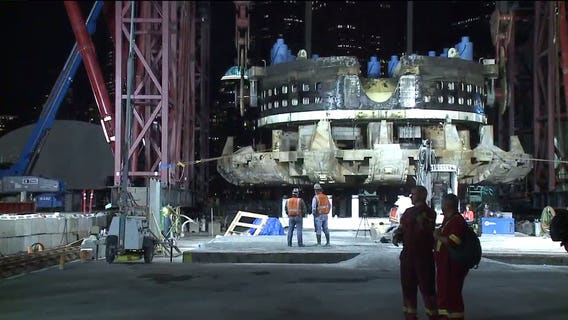 Bertha's Back: Front end of broken Seattle tunnel machine lifted out of ground