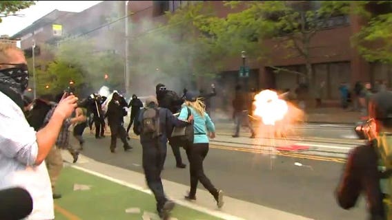 Police arrest man accused of throwing Molotov cocktail at officers in 2016 May Day