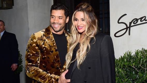 Russell Wilson talks dirty diapers, 'hiking the baby out'