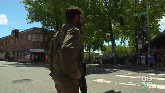 People grab rifles and board up to protect Kirkland businesses from looters