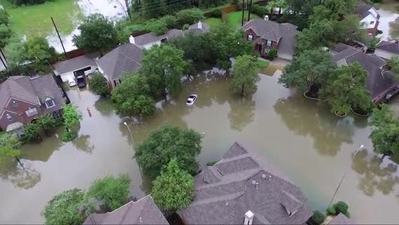 Rescuers pluck hundreds from rising floodwaters in Houston