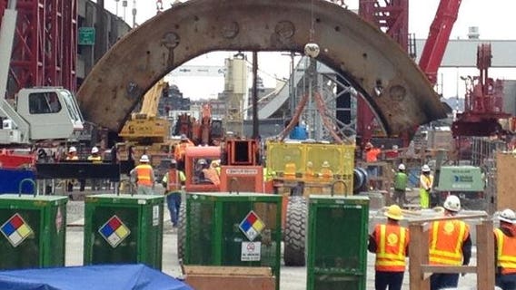 Crews pulling pieces of Seattle tunnel machine Bertha to surface