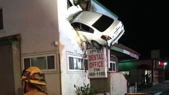 Car goes airborne, slams into 2nd floor of California office