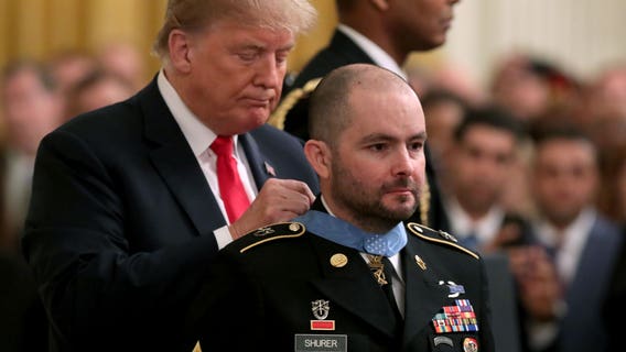 Former Army medic who won Medal of Honor will raise flag at Apple Cup