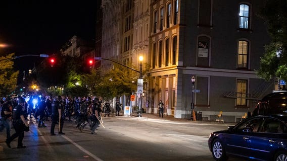 Louisville police and soldiers return fire, killing man