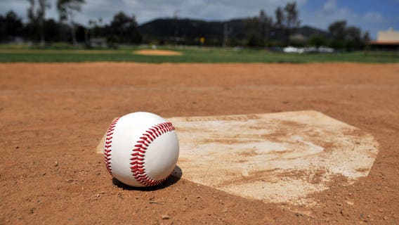 Entire high school baseball team kneels for national anthem during 1st game of season
