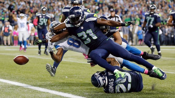 Kam Chancellor's big play helps Seahawks beat Lions 13-10