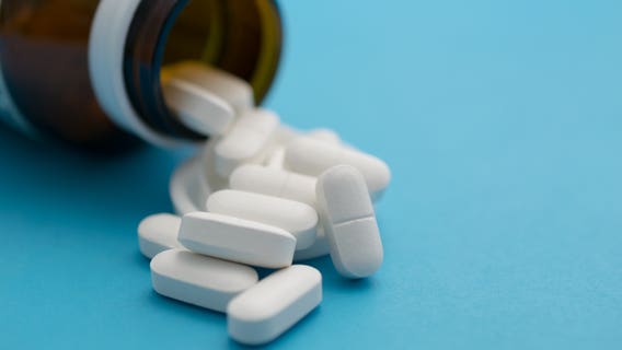 Cops say man tipped server with Valium pill