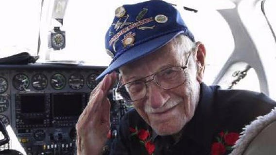 101-year-old WWII fighter pilot flies one last mission with his original plane