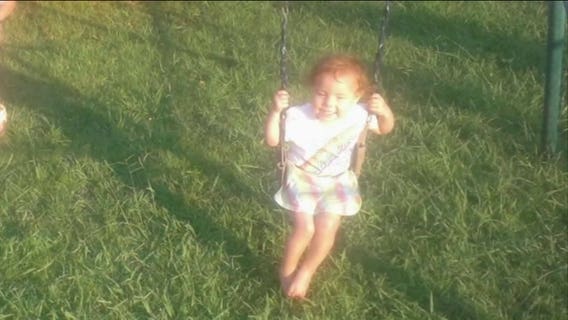 Toddler saves family from house fire as her own clothes burn