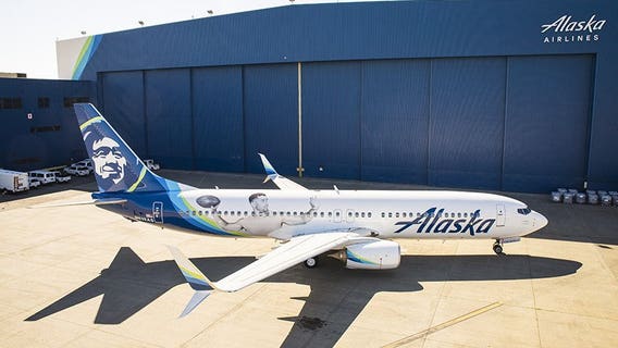 Alaska Airlines debuts Russell Wilson plane, offers early boarding to passengers wearing Wilson's jersey