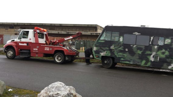 Police arrest Seattle man after finding meth, heroin in camouflage-painted RV