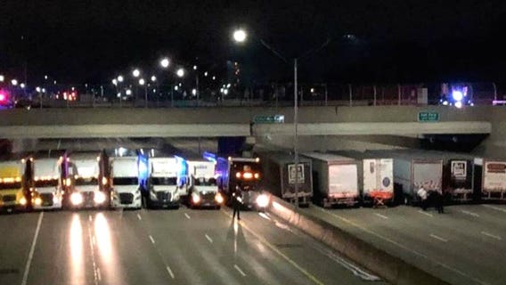 13 semis join forces to help save suicidal man on Detroit freeway