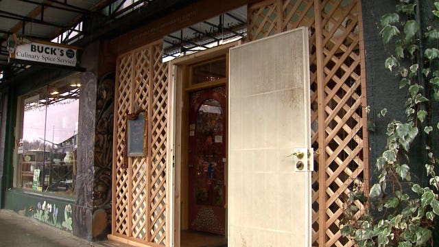 City of Olympia: Business owner in violation after building wall to keep out homeless