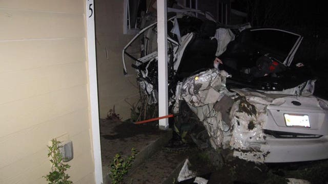 Man showing off new car crashes it into home