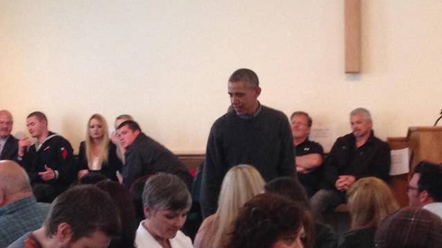 Obama tours devastation, vows to stand with 'Oso strong'