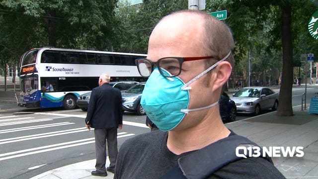 Face masks being used by some braving unhealthy smoky conditions