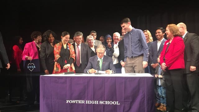 Inslee signs package of voter access bills into law, including automatic registration