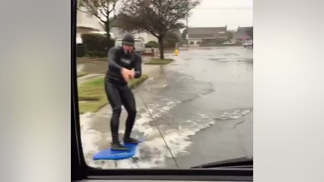 VIDEO: Man surfs up Los Angeles-area street