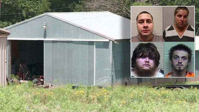 Four arrested after 15-year-old found living with barn animals, eating twigs and grass