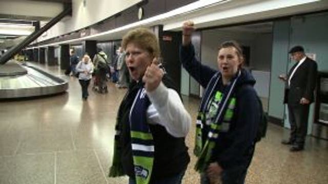 Seahawks fans trickling back into Seattle after weather snarls air travel