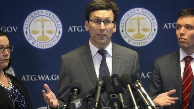 Washington, other states seeking to block Trump travel ban want new hearing