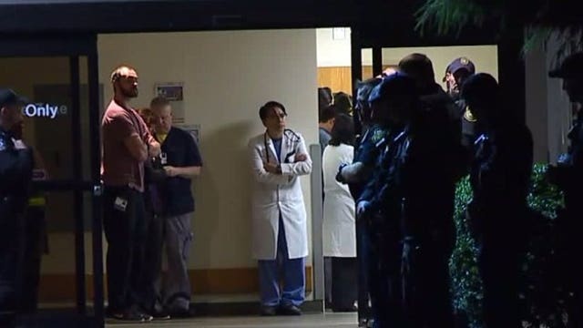 Officer shot and killed in E. Tacoma; standoff over