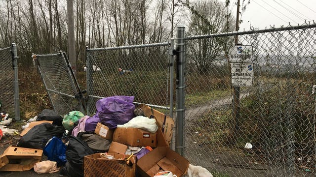 Flooding, drainage system issues prompt partial Seattle homeless camp sweep