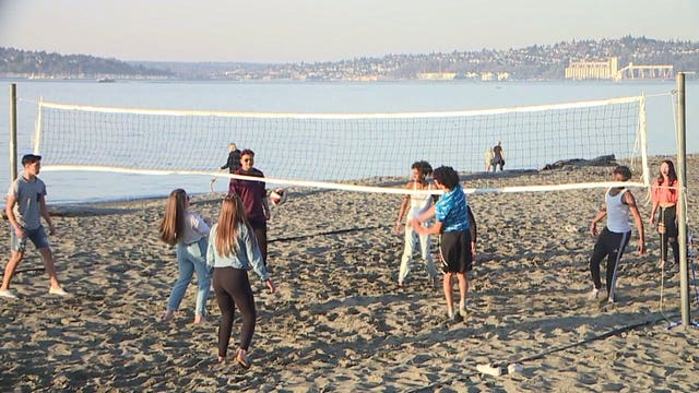 How would virus restrictions be modified, ended in Washington state?