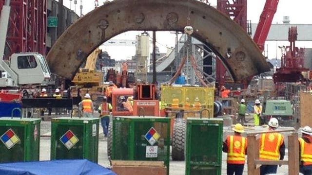 Crews pulling pieces of Seattle tunnel machine Bertha to surface