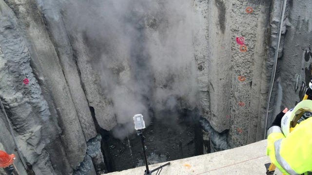 SEE IT: Tunneling machine Bertha breaks through concrete wall into access pit