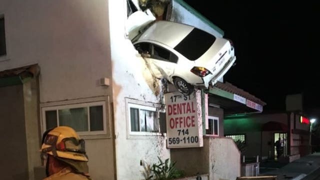 Car goes airborne, slams into 2nd floor of California office
