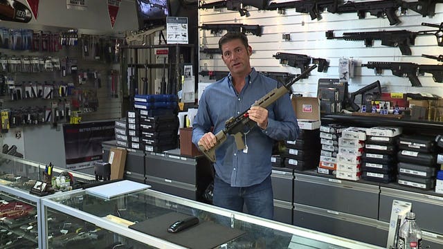 Despite backlash, Bellevue gun shop owner decides not to sell long guns to most people under 21