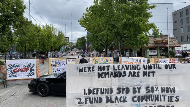 CHOP protesters staying put at Seattle police precinct