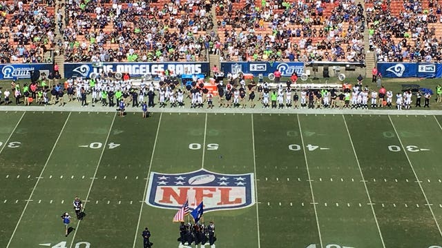 All Seahawks stand as national anthem plays. 'Today wasn't the day to sit down'